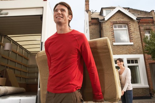 Loading furniture and boxes into a removal van in Brent