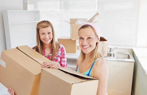 Mover handling furniture carefully during transport
